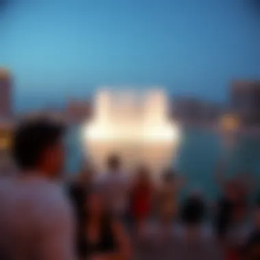 Captivating Moments: Visitors at the Dubai Fountain Panoramic view of visitors enjoying the Dubai Fountain show