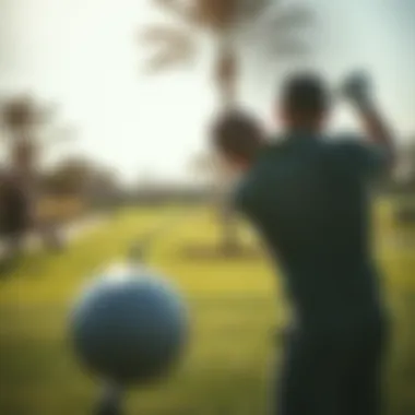 Golfer in Action at Dubai Hills Golf Grove A golfer teeing off at Dubai Hills