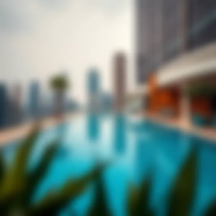 Elegant swimming pool area of Executive Tower with city backdrop