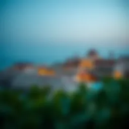 A panoramic view of Al Jazira Al Hamra showcasing its coastal beauty and heritage architecture