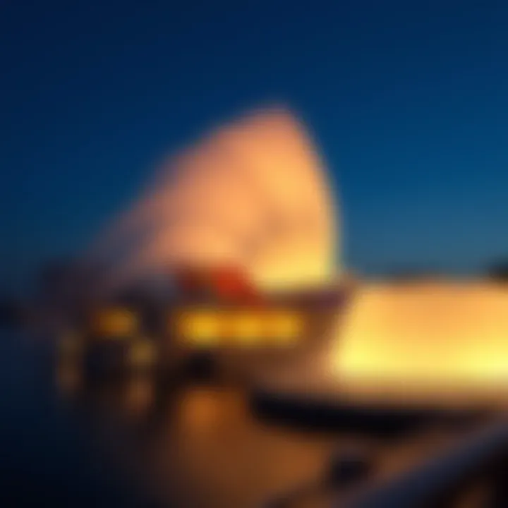 Evening view of the Dubai Fountain illuminated against the night sky
