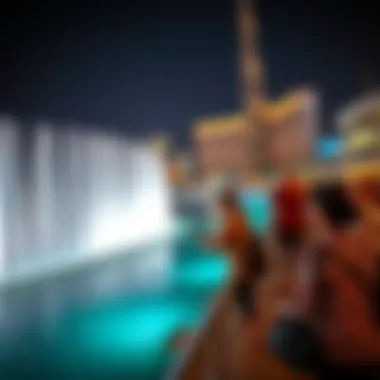 Visitors enjoying the Dubai Fountain show from the boardwalk