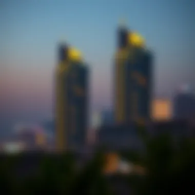 Illuminated Rashidiya Towers at Dusk Evening skyline featuring Rashidiya Towers illuminated