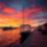 Stunning sunset view over كورنيش الممزر showcasing the vibrant colors of the sky reflecting on the water.