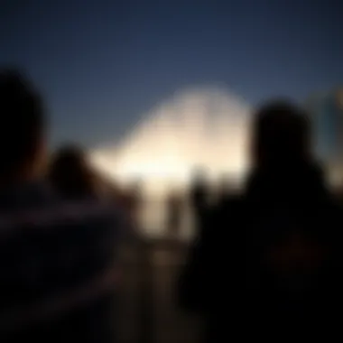 Spectators at the Dubai Fountain Show Visitors enjoying the Dubai Fountain Show from a distance